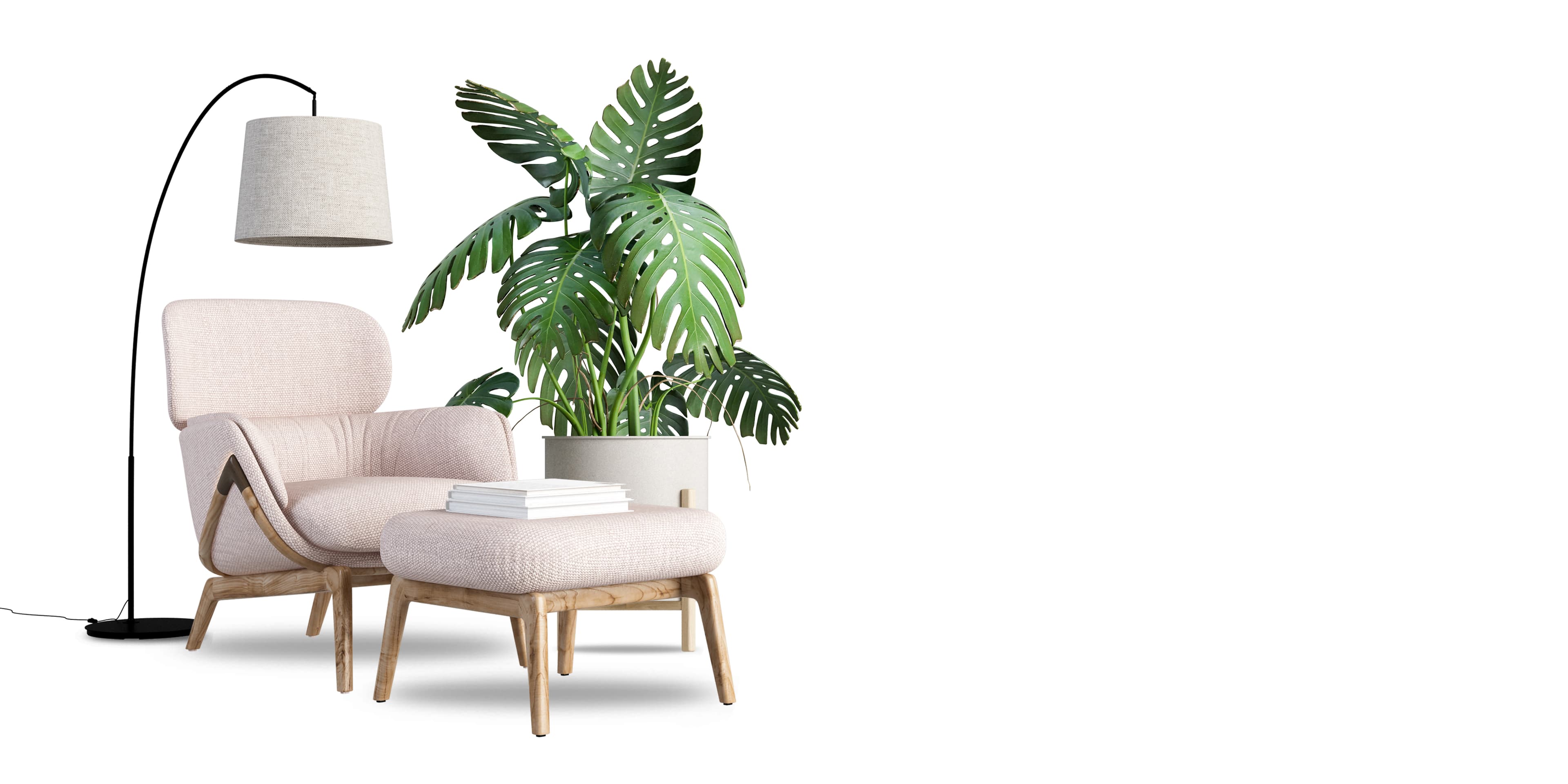 Cream lounge chair beside a leafy plant in soft light